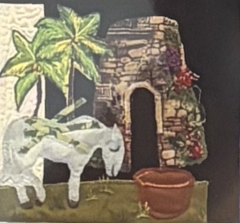 Quilted panel by Agnes Meeker depicting a stone sugar-estate windmill, a copper sugar kettle, a palm tree, and a donkey standing in the foreground.